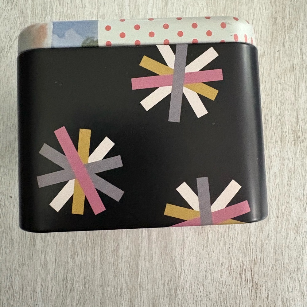 Fossil Pink Tin with Rabbit Design